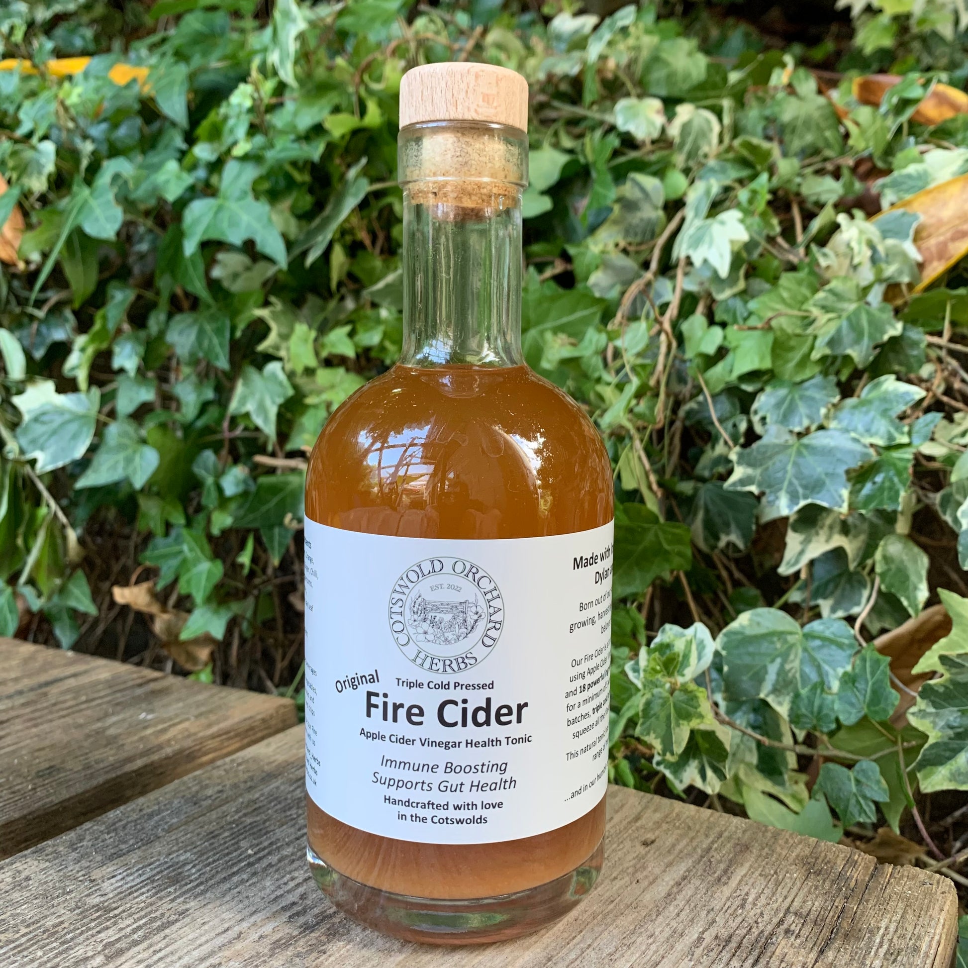 Front-facing Original Fire Cider 350ml bottle – immune-boosting apple cider vinegar health tonic, triple cold pressed and handcrafted in the Cotswolds by Cotswold Orchard Herbs